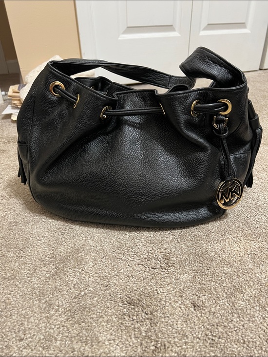 Michael Kors Handbags - Michael Kors Black Pebbled Leather Drawstring Hobo with Gold MK Charm